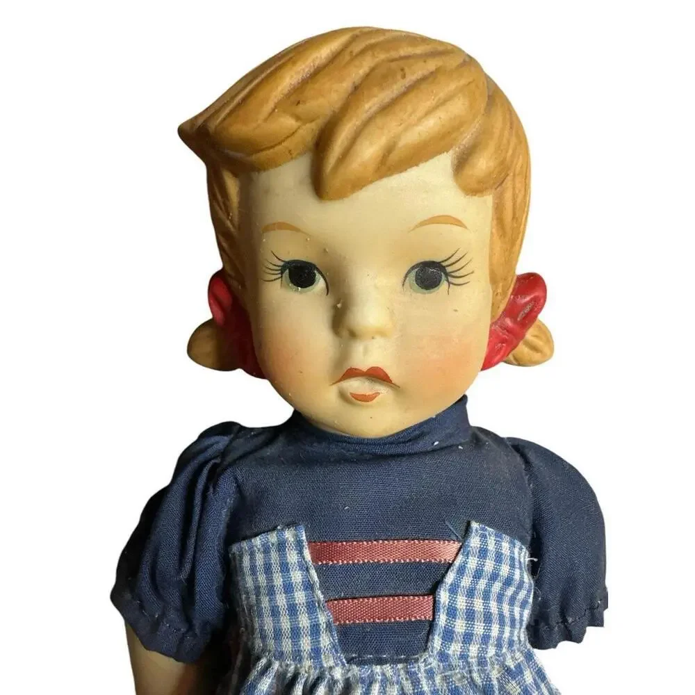 Doll 1982 Handpainted Bisque Porcelain Alpine Boy Doll needs to be RESTRUNG